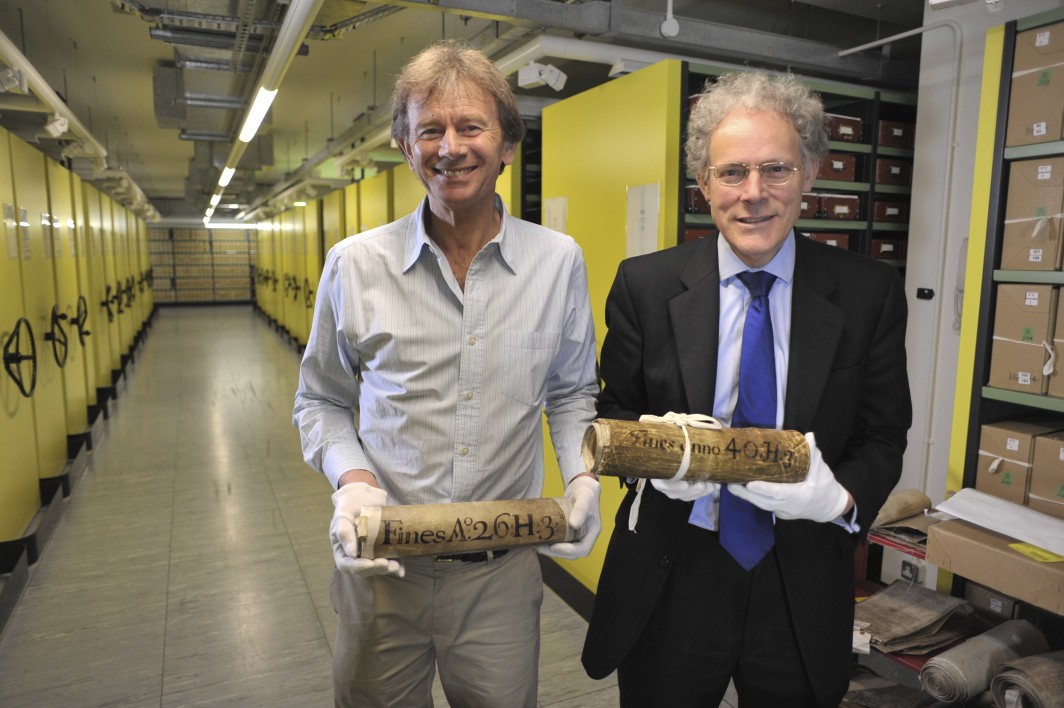 David Carpenter and Michael Wood looking through the Fine Rolls at TNA.